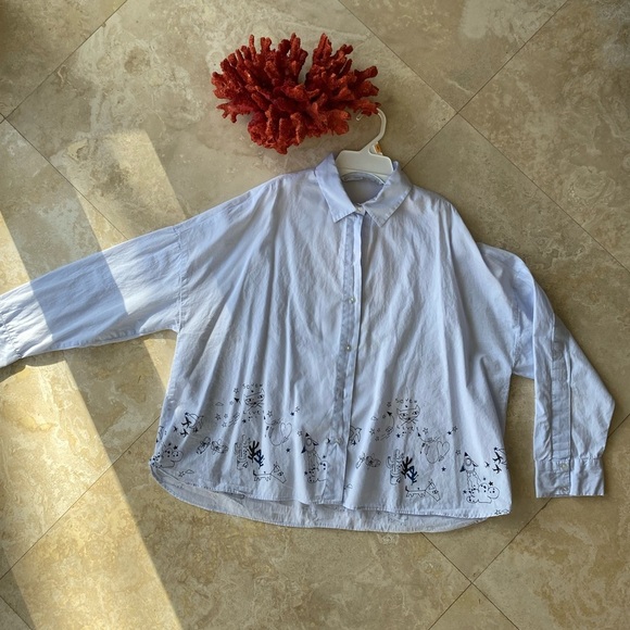 Zara Tops - Zara light blue Button-Up Shirt with Black Print